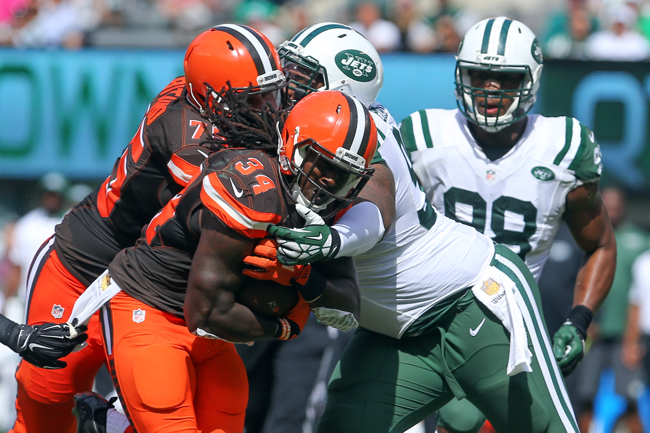 Johnny Johnson of the New York Jets carries the ball against the