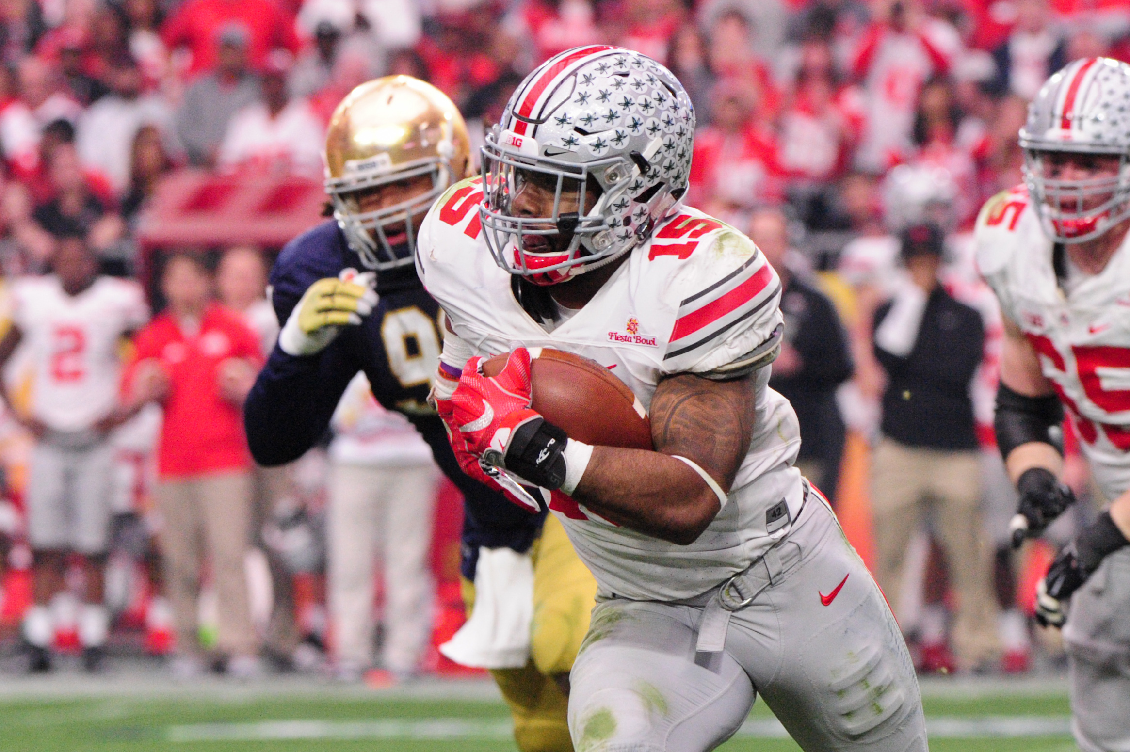 Ohio State running back Ezekiel Elliott holds his jersey after being  selected by the Dallas Cowboys with the fourth overall pick in the 2016 NFL  Draft on April 28, 2016 in Chicago.