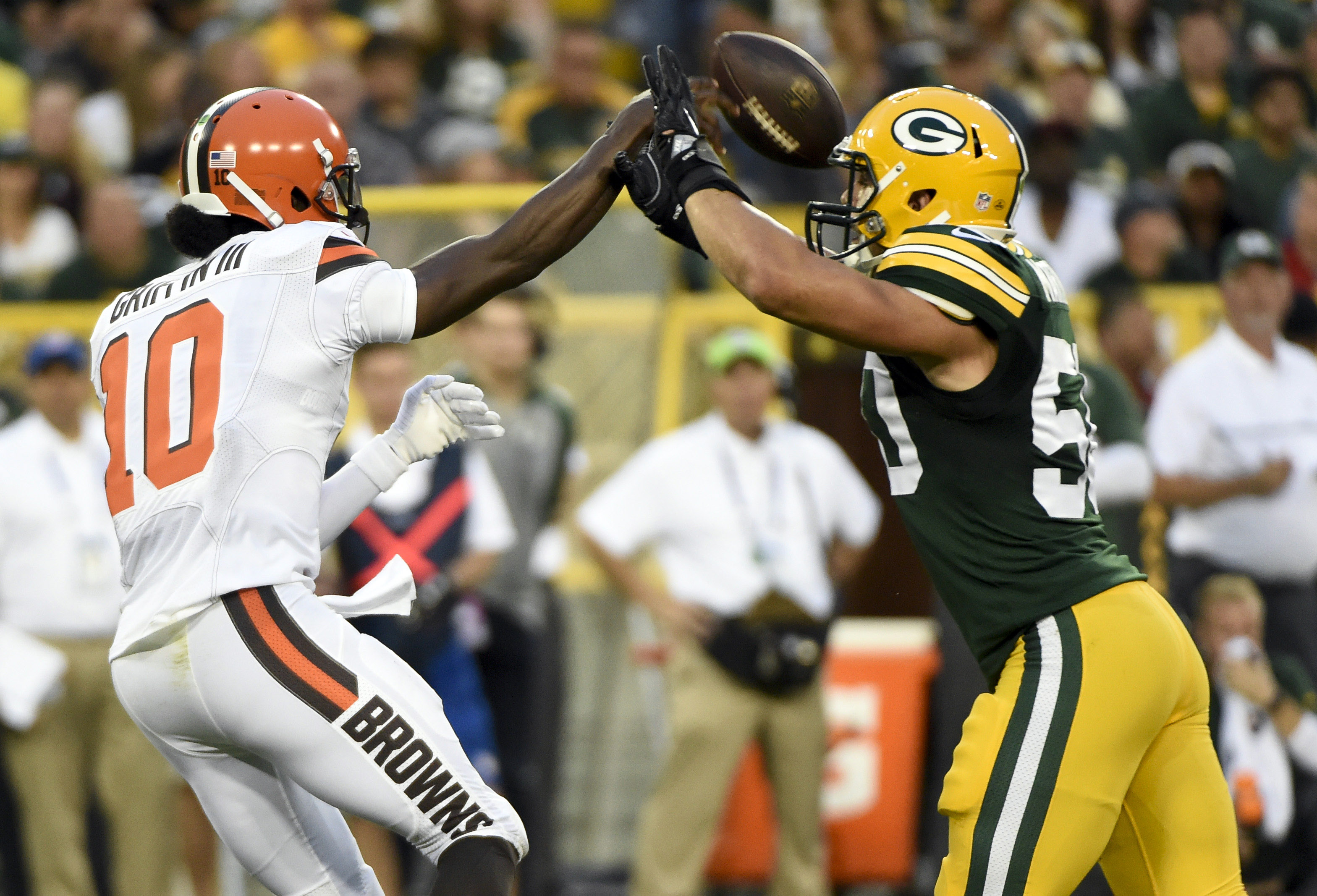 Robert Griffin III completes a long pass, throws interception in