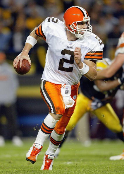 Quarterback Tim Couch of the Cleveland Browns scrambles with the