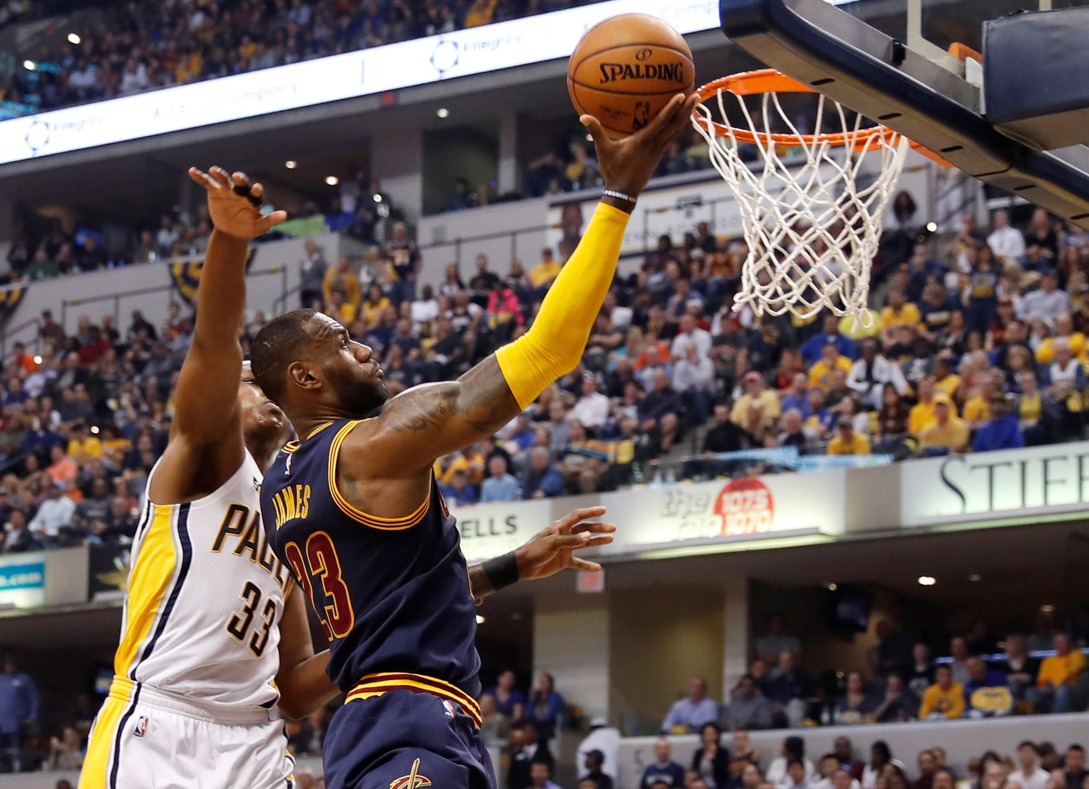 NBA playoffs: James helps Cavs hold off Pacers, earn sweep into